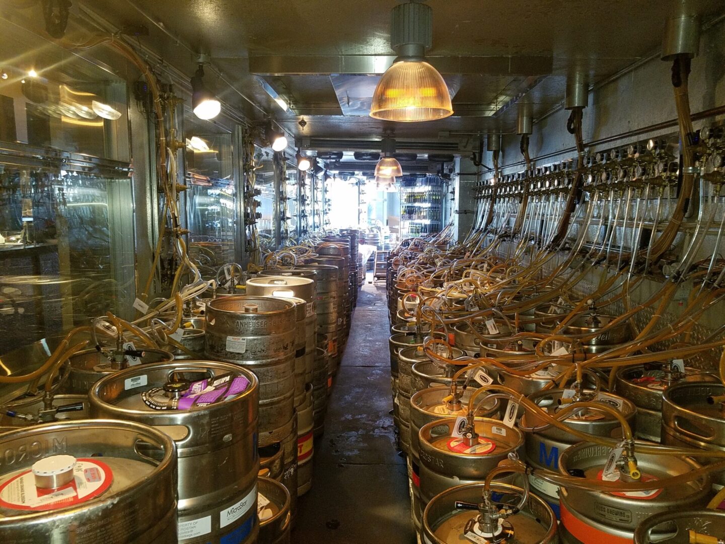 A room filled with many different types of beer.