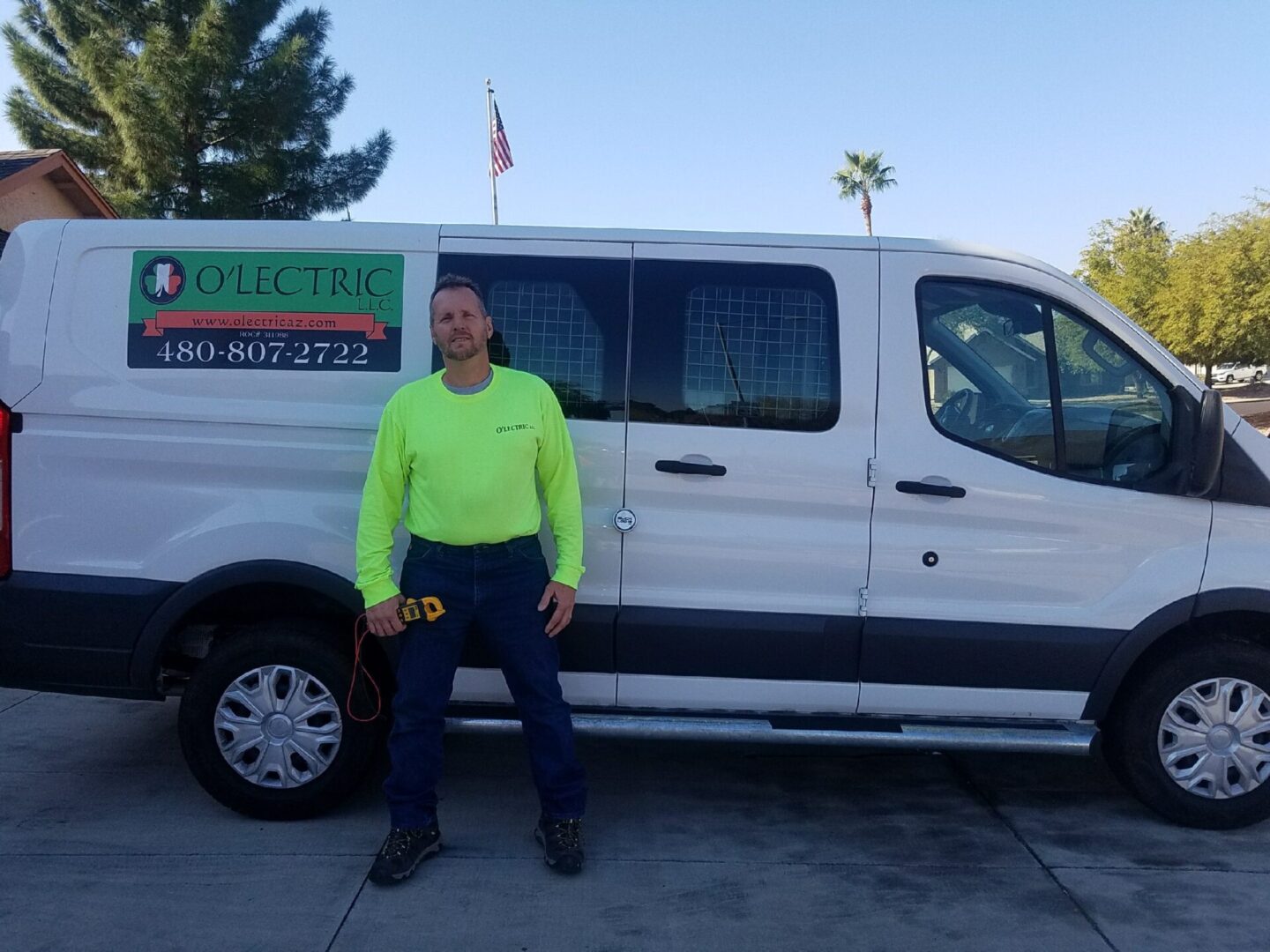 A man standing in front of a van.